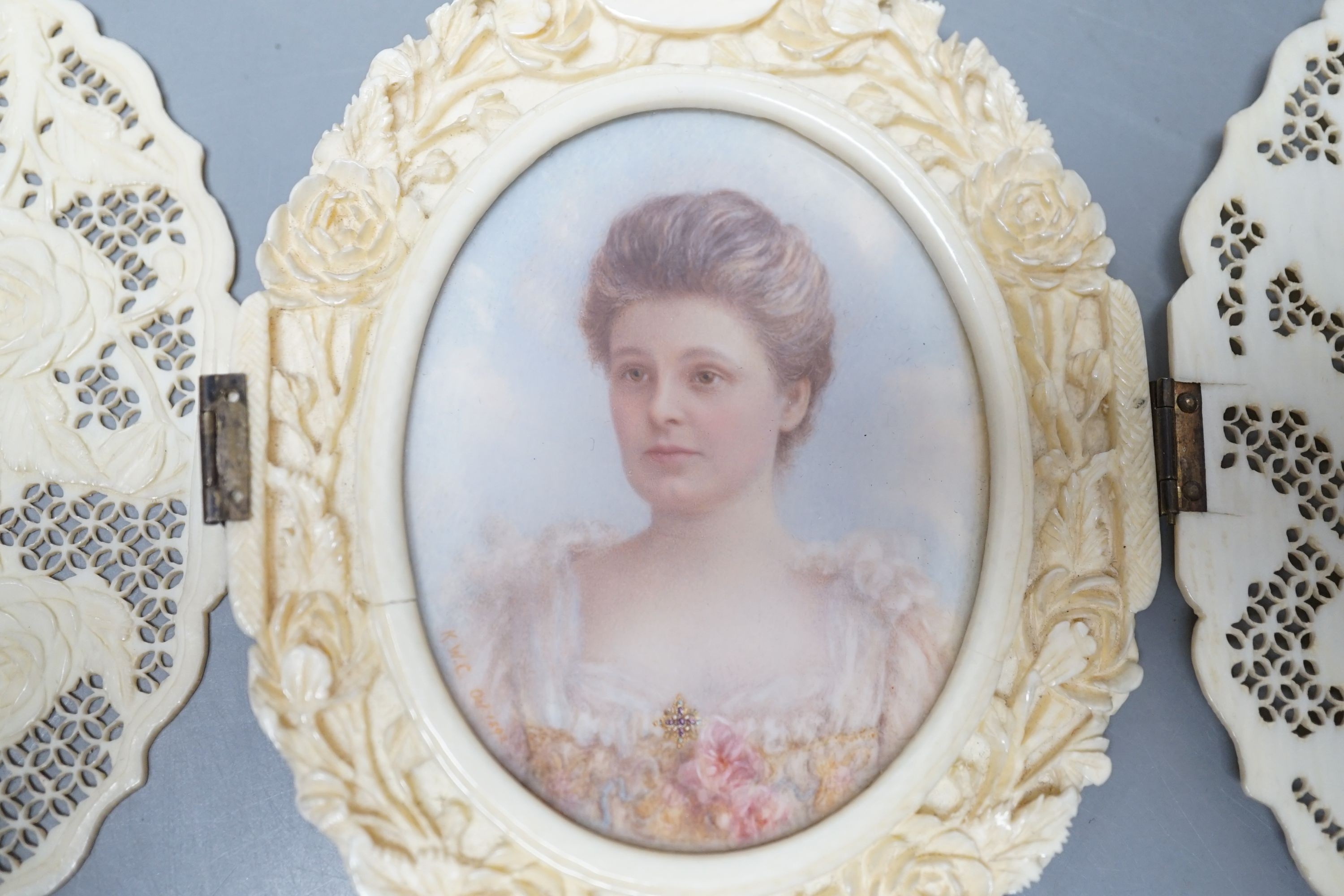 A carved and pierced ivory framed miniature. ‘Edith wife of C.Constable Curtis Esq. Collingshaw Newark - Painted by K.Wilfred Collyer 8th October 1892’ to reverse, 11.5cm high